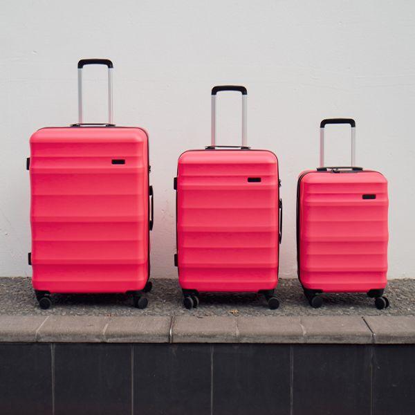 Hot Pink Luna Air 2 Suitcases lined up from large to small