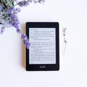 Kindle E-Reader with a sprig of lavender 