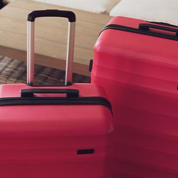 Hot pink luna air suitcase handles