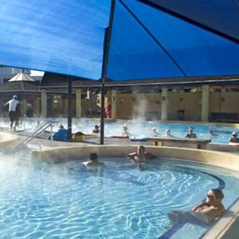 People bathing at Mount Maunganui Hot Pools