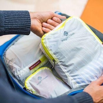 Eagle Creek packing cubes being packed into a bag