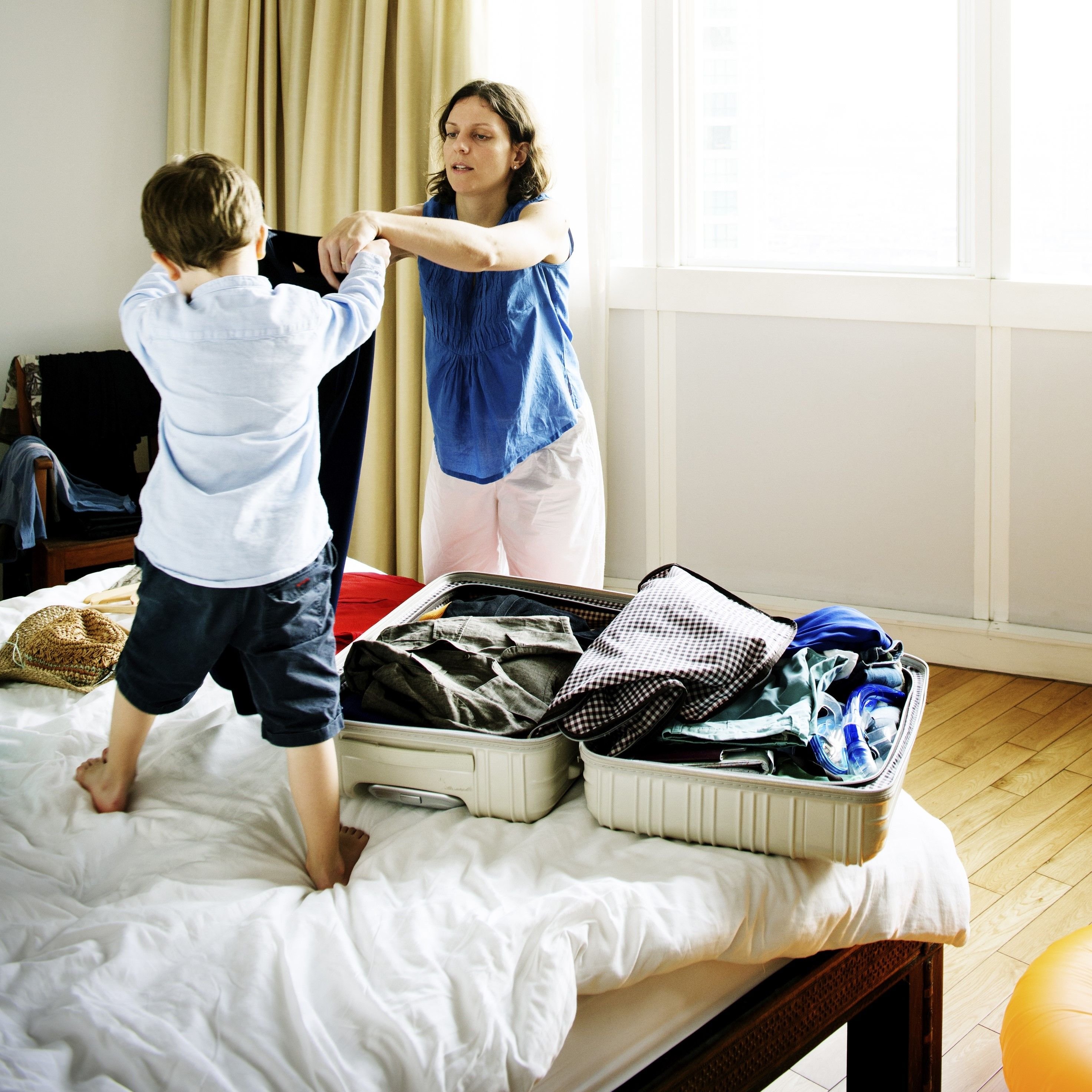 child helping mum pack