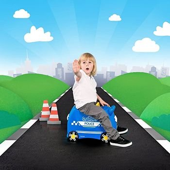 Child on the Percy the Police Trunki on a cartoon road