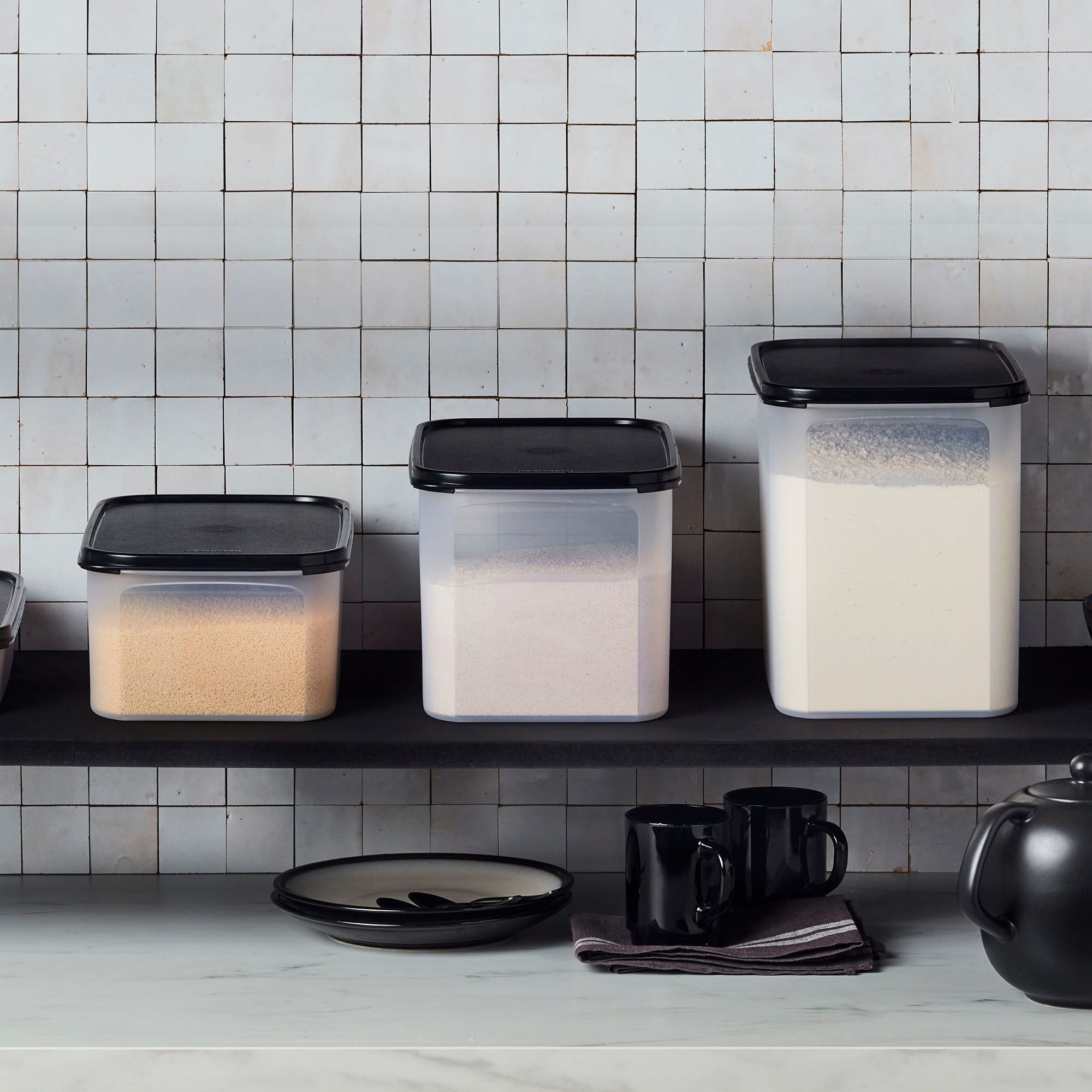 Square Modular Mates in three different sizes, lined up on a pantry shelf