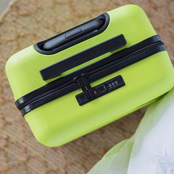 Neon lime luna air suitcase tsa lock close up