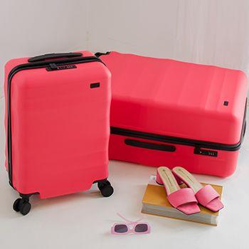 Luna Air Carry-On and Large in Hot Pink, featuring pink shoes and pink sunglasses 