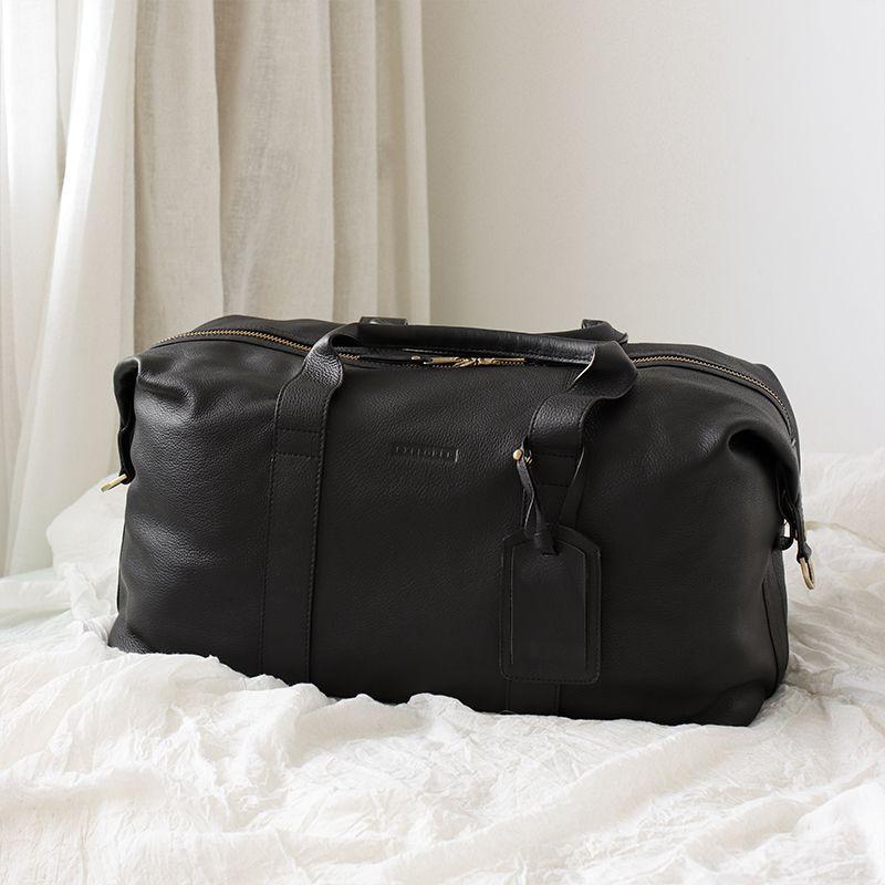 Explorer Weekender Duffle Black on bed