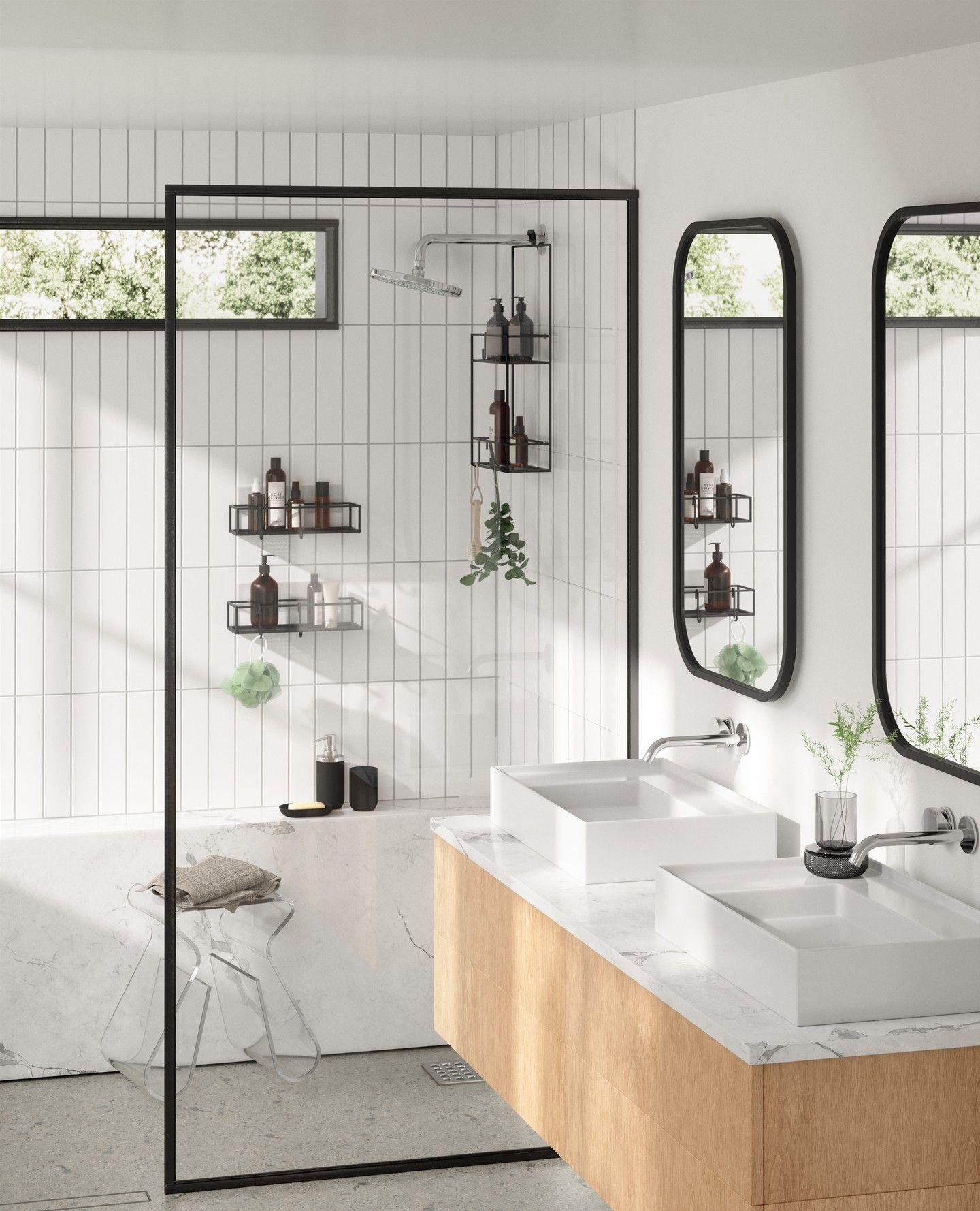 bathroom with wall mirrors, stool and shower oranisers