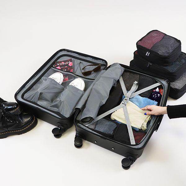 Packing cubes organised inside an Explorer Luna Air suitcase
